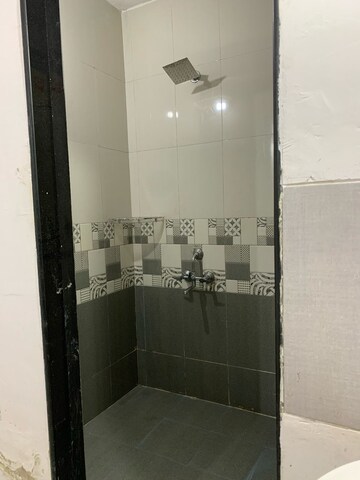 Bathroom in 1 BHK Apartment at Unnat Nagar CHS, Goregaon West – for Rent