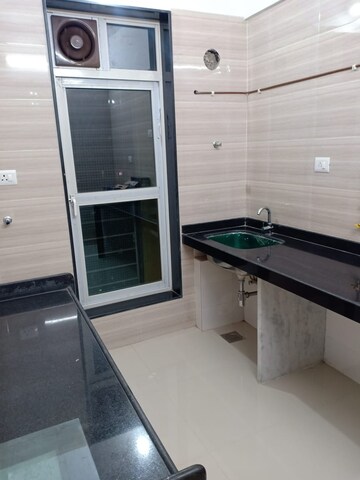 Kitchen in 2 BHK Apartment at Lodha Amara, Kolshet Road – for Sale