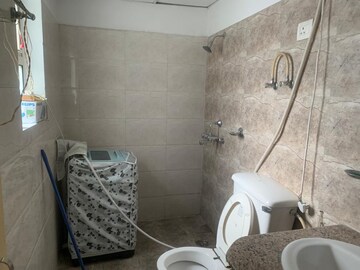 Bathroom in 2 BHK Apartment at NK Sharma Savitry Greens 2, Ghazipur – for Rent