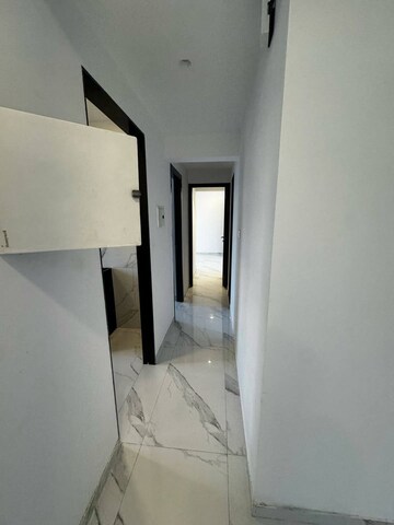 Building Lobby in 2 BHK Apartment at Dev Leo Tower, Oshiwara – for Rent