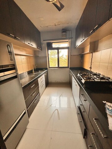 Kitchen in 2 BHK Apartment at Lodha Splendora, Ghodbunder Road – for Rent