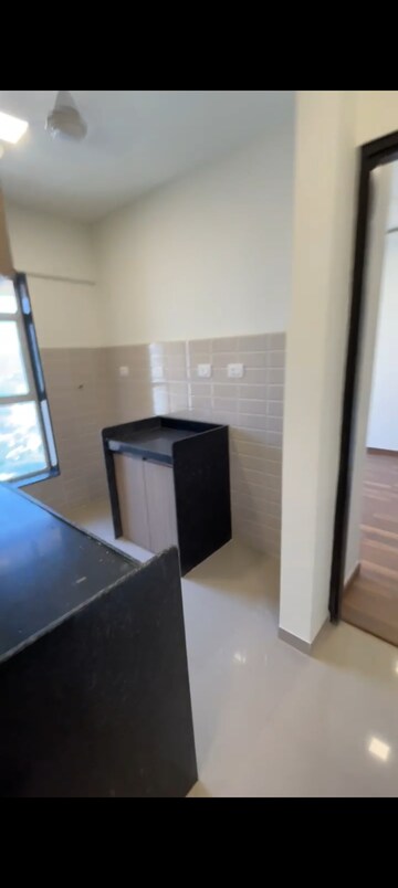 Kitchen in 2 BHK Apartment at Walchand Residency, Mira Road – for Rent
