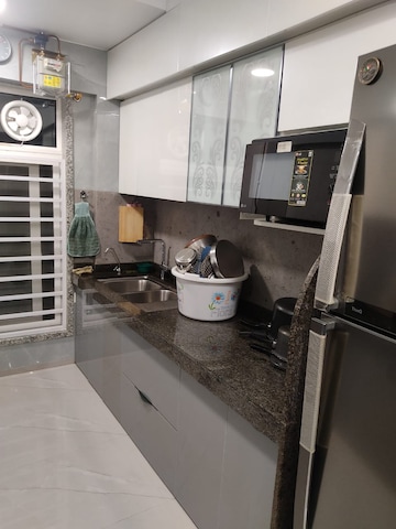 Kitchen in 3 BHK Apartment at Dhaval Sunrise Orlem, Malad West – for Sale