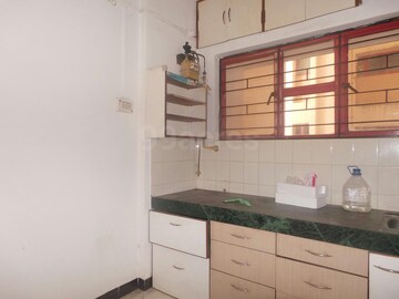 Kitchen in 2 BHK Apartment at Woodland Avenue, Kothrud – for Rent