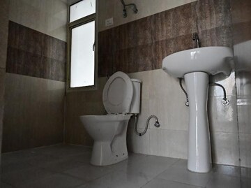 Bathroom in 3 BHK Apartment at Amrapali Golf Homes, Sector 4, Greater Noida – for Sale