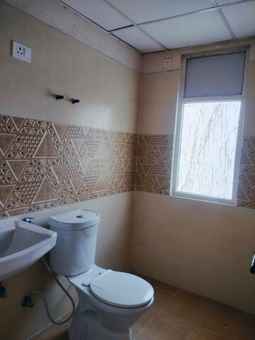 Bathroom in 3 BHK Apartment at Amrapali Golf Homes, Sector 4, Greater Noida – for Sale