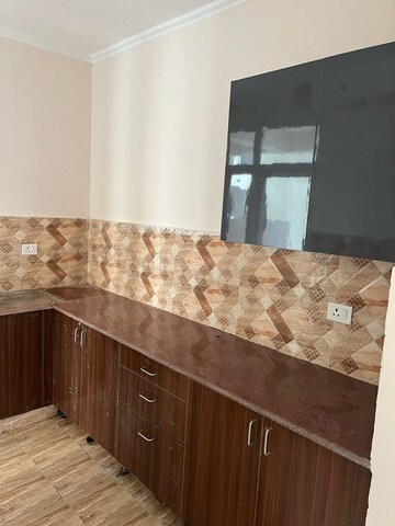 Kitchen in 3 BHK Apartment at Amrapali Golf Homes, Sector 4 Greater Noida – for Rent