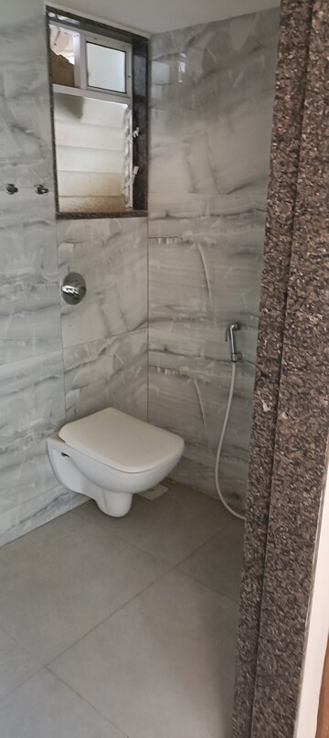 Bathroom in 1 BHK Apartment at PNK Winstone, Mira Road – for Rent