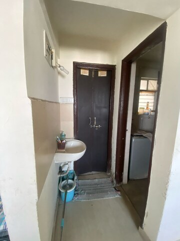 Building Lobby in 1 BHK Apartment at Eisha Erica, Dhayari – for Sale