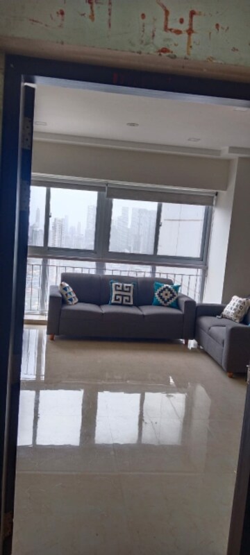 Living Room in 2 BHK Apartment at Ruparel Ariana, Parel – for Rent