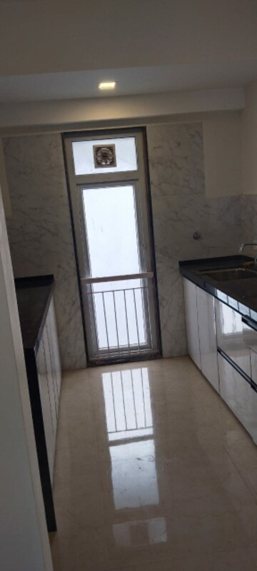 Kitchen in 2 BHK Apartment at Ruparel Ariana, Parel – for Rent