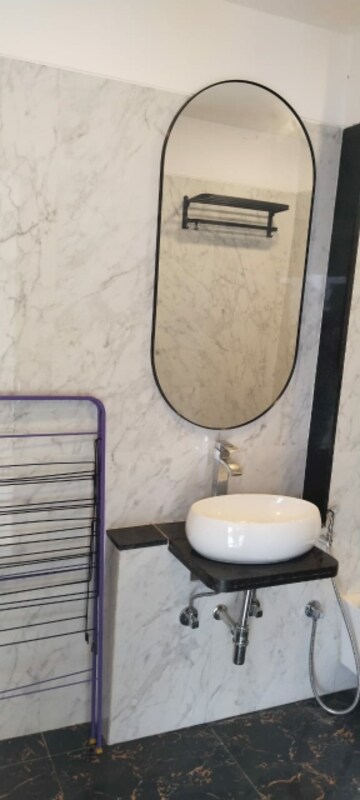 Bathroom in 2 BHK Apartment at Ruparel Ariana, Parel – for Rent