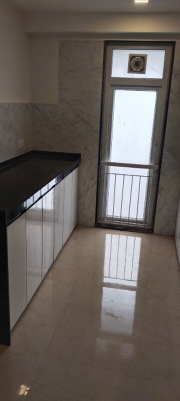 Kitchen in 2 BHK Apartment at Ruparel Ariana, Parel – for Rent