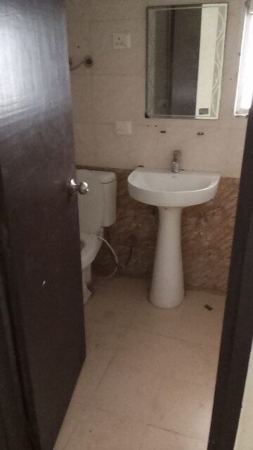 Bathroom in 2 BHK Apartment at Gulmohur Garden, Raj Nagar Extension – for Rent