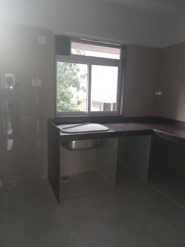Kitchen in 2 BHK Apartment at Blue Regency, Kandivali West – for Sale