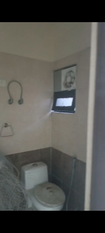 Bathroom in 2 BHK Apartment at Sangwan Heights, Raj Nagar Extension – for Rent