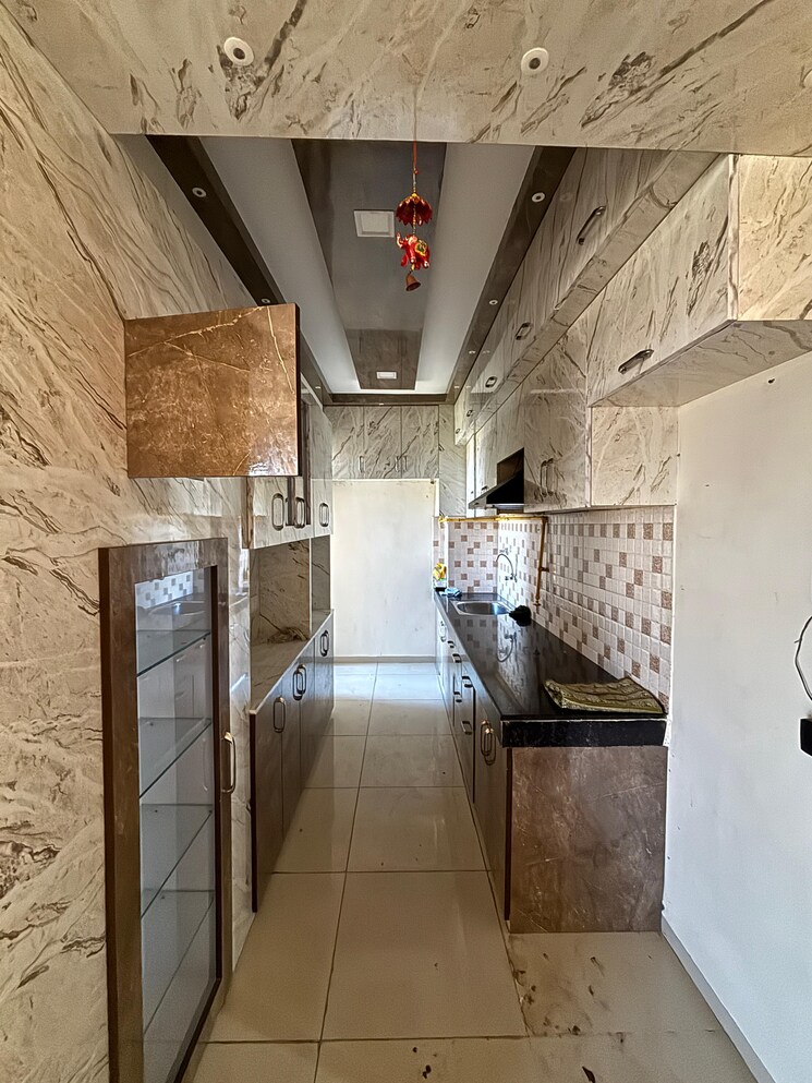 Kitchen, wave-dream-homes 2 Bedroom 808 Sq.Ft. Apartment In Wave City Ghaziabad 8353391