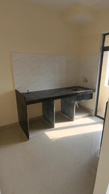 Kitchen in 1 BHK Apartment at Paradigm Zenith Pushpanjali Residency Phase III, Ghodbunder Road – for Rent