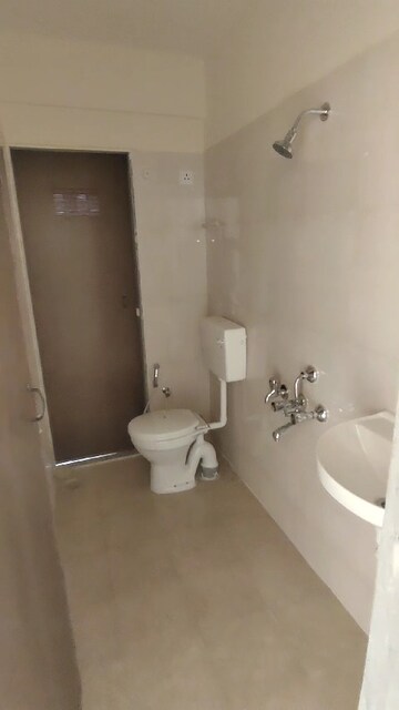 Bathroom in 1 BHK Apartment at Paradigm Zenith Pushpanjali Residency Phase III, Ghodbunder Road – for Rent
