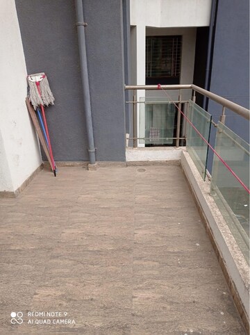 Balcony in 2 BHK Apartment at 33 Milestone, Wakad – for Rent