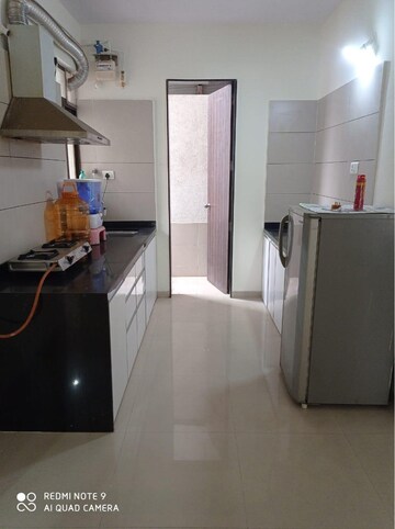 Kitchen in 2 BHK Apartment at 33 Milestone, Wakad – for Rent