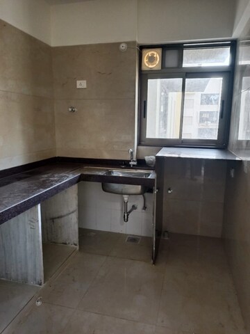 Kitchen in 2 BHK Apartment at Chandak Cornerstone, Worli – for Rent