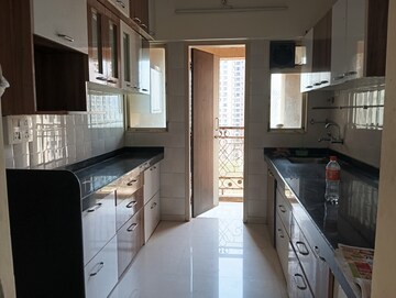 Kitchen in 2 BHK Apartment at Rosa Oasis, Ghodbunder Road – for Rent