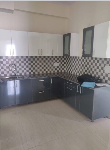Kitchen in 3 BHK Apartment at Gaur Saundaryam, Tech Zone 4 Greater Noida – for Rent