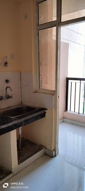 Kitchen in 2 BHK Apartment at Eureka Diya Green City, Raj Nagar Extension – for Sale