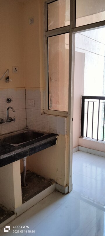 Kitchen in 2 BHK Apartment at Eureka Diya Green City, Raj Nagar Extension – for Sale