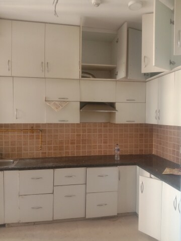Kitchen in 3 BHK Apartment at Mahagun Mywoods, Sector 16c Greater Noida – for Rent