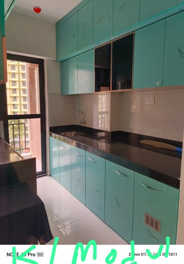 Kitchen in 2 BHK Apartment at Runwal Gardens, Dombivli East – for Sale