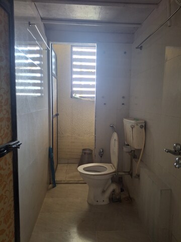 Bathroom in 1 BHK Apartment at Ram Pushpanjali Residency, Owale – for Rent