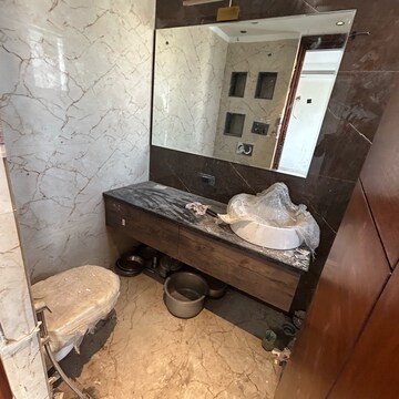Bathroom in 3 BHK Builder Floor at South Extension I – for Sale
