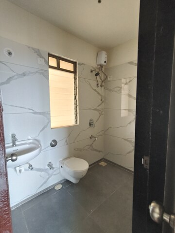 Bathroom in 1 BHK Apartment at Raunak City, Kalyan West – for Rent