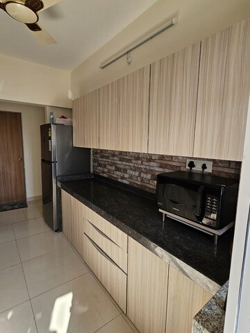 Kitchen in 2 BHK Apartment at Godrej City Panvel Phase 1, Poyanje – for Rent