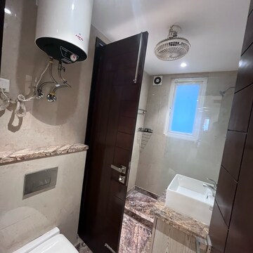 Bathroom in 3 BHK Builder Floor at Ansal Sushant Lok I, Sector 43 – for Rent