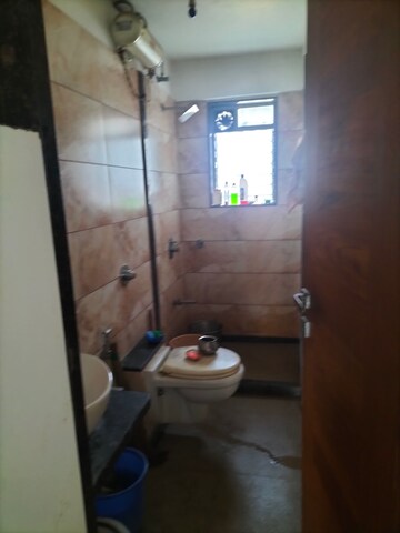 Bathroom in 2 BHK Apartment at Satya Niwas Vile Parle East, Vile Parle East – for Rent