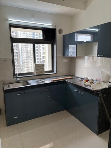 Kitchen in 2 BHK Apartment at Runwal Eirene, Balkum Pada – for Rent