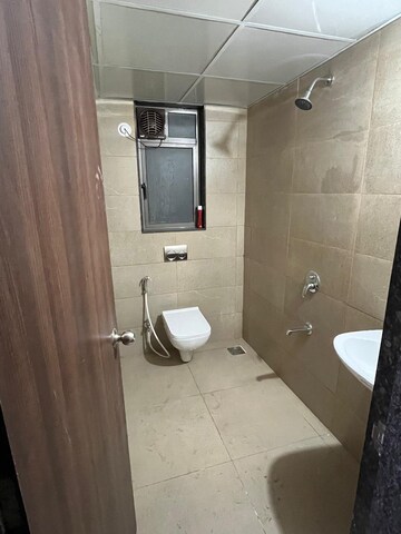Bathroom in 2 BHK Apartment at Runwal Eirene, Balkum Pada – for Rent
