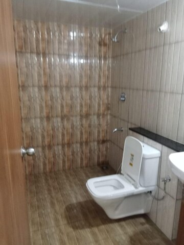 Bathroom in 3 BHK Apartment at Mantri Webcity, Hennur – for Rent
