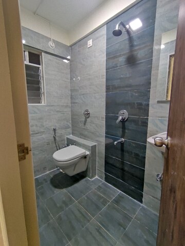 Bathroom in 2 BHK Apartment at Vishesh Balaji Symphony, New Panvel – for Rent