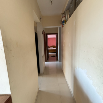 Building Lobby in 2 BHK Apartment at Sahayog Nilayam, Titwala – for Sale