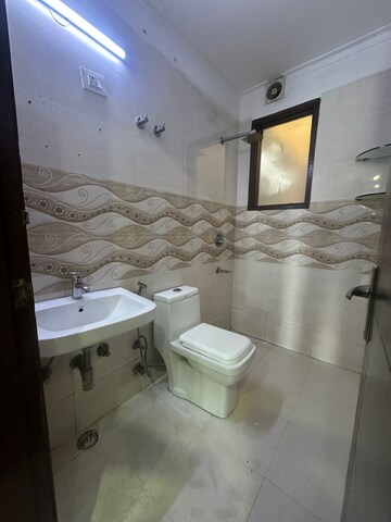 Bathroom in 2 BHK Builder Floor at Freedom Fighters Enclave – for Rent