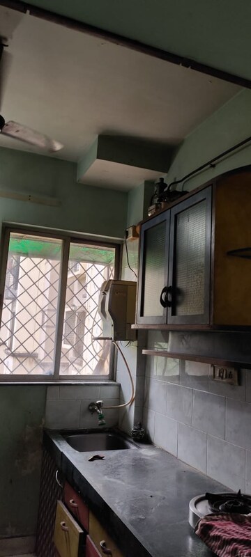 Kitchen in 1 BHK Apartment at Swastik Park CHS, Ghodbunder Road – for Rent