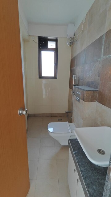 Bathroom in 3 BHK Apartment at Naman Habitat, Andheri West – for Rent