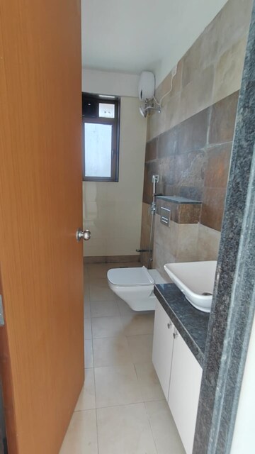 Bathroom in 3 BHK Apartment at Naman Habitat, Andheri West – for Rent