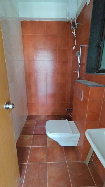 Bathroom in 3 BHK Apartment at Naman Habitat, Andheri West – for Rent