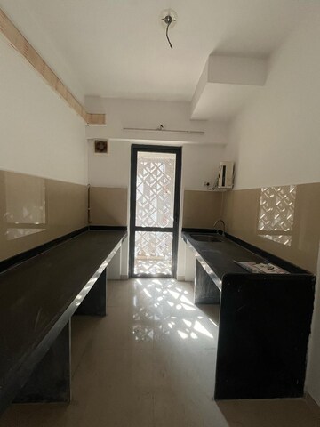 Kitchen in 1.5 BHK Apartment at Lodha Lakeshore Greens, Dombivli East – for Rent