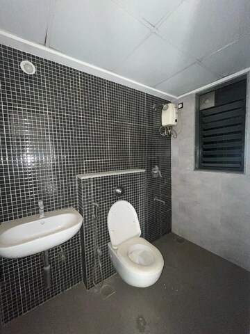 Bathroom in 1.5 BHK Apartment at Lodha Lakeshore Greens, Dombivli East – for Rent